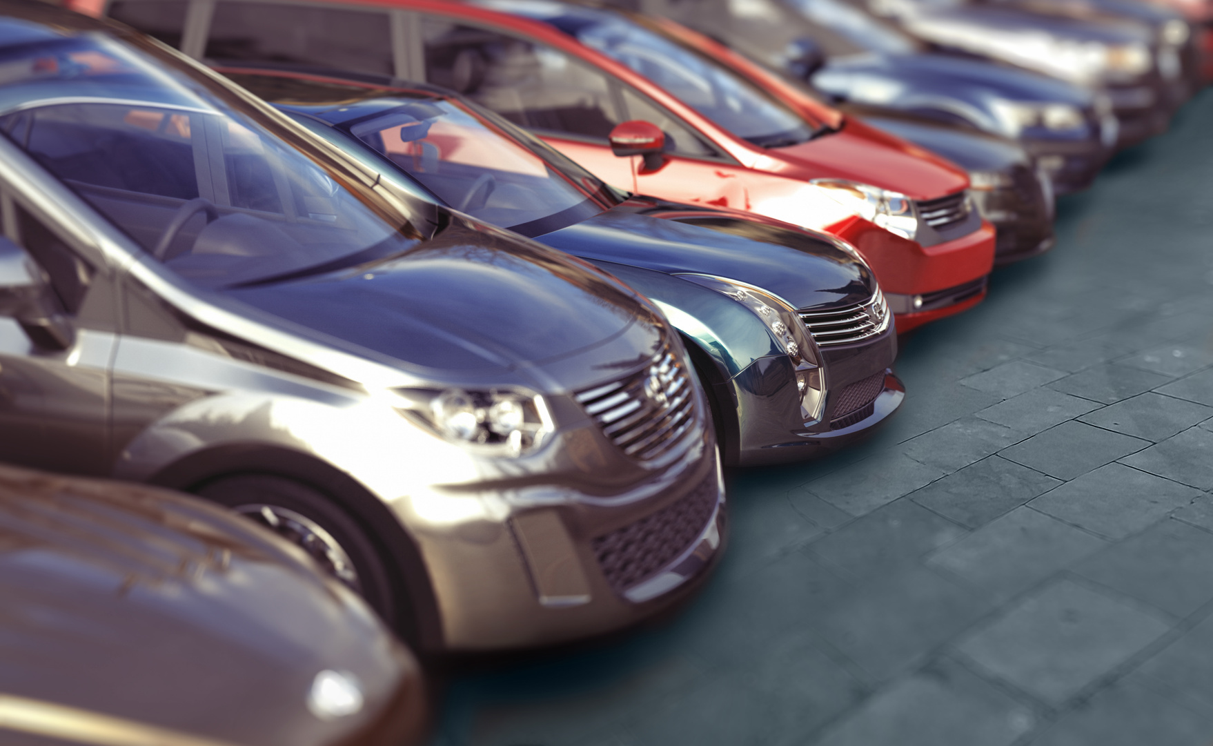 Cars in a line at a dealership