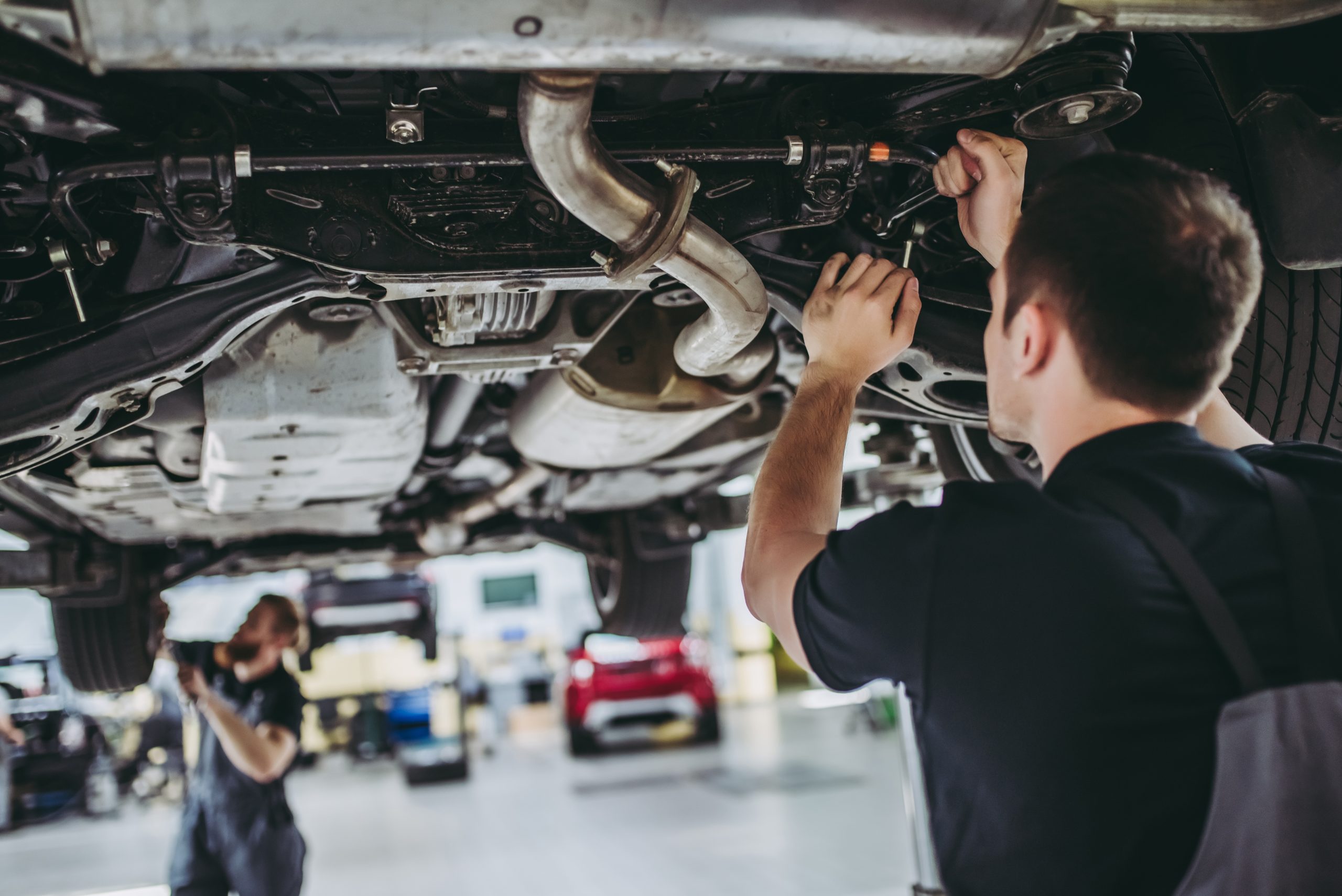 mechanic working on a car