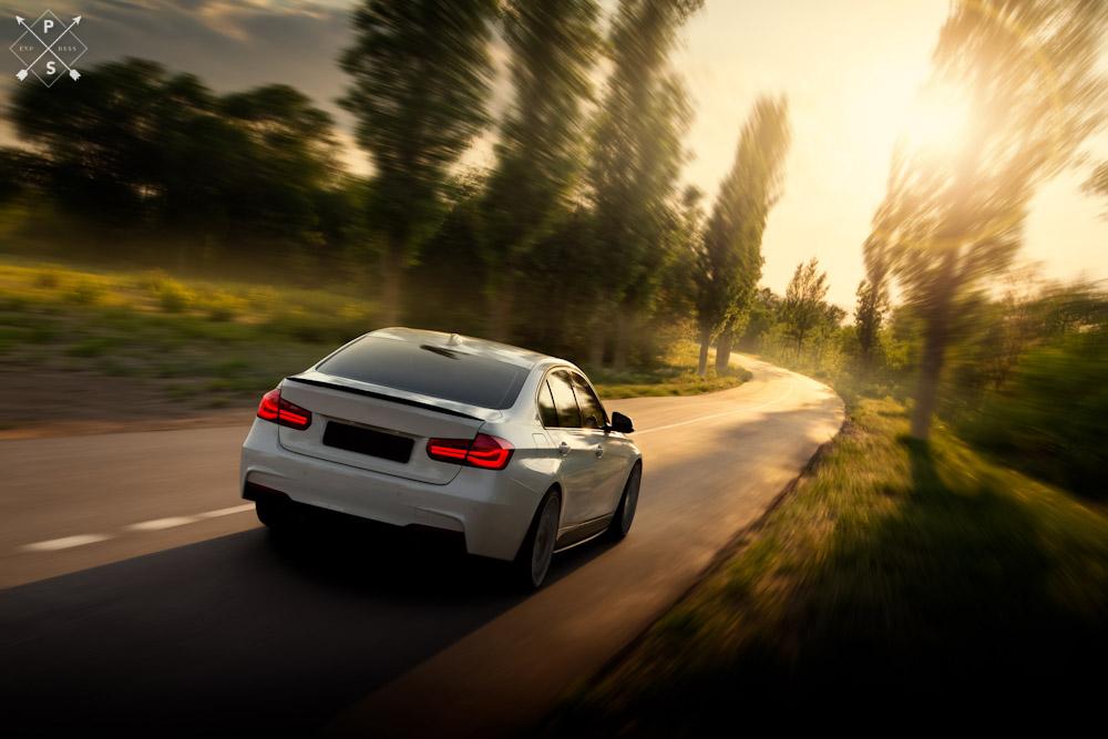 Car driving down mountain roadway