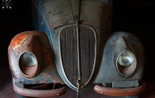 Old vintage car in need of restoration and car repair