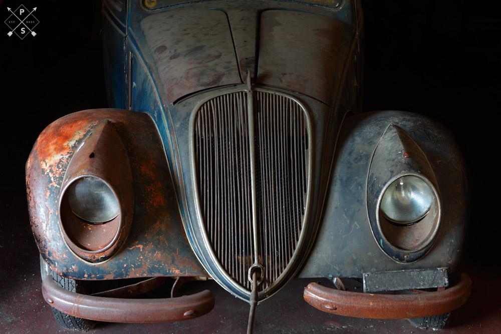 Old vintage car in need of restoration and car repair
