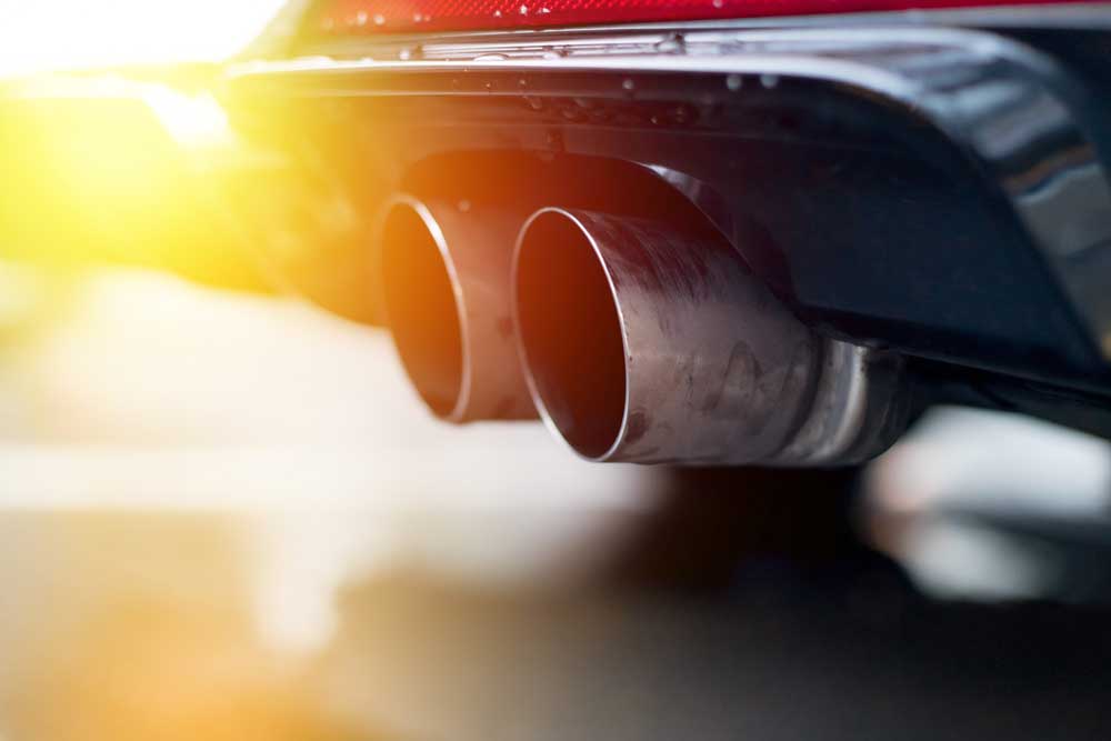 Image of car tailpipe. Emissions concept.