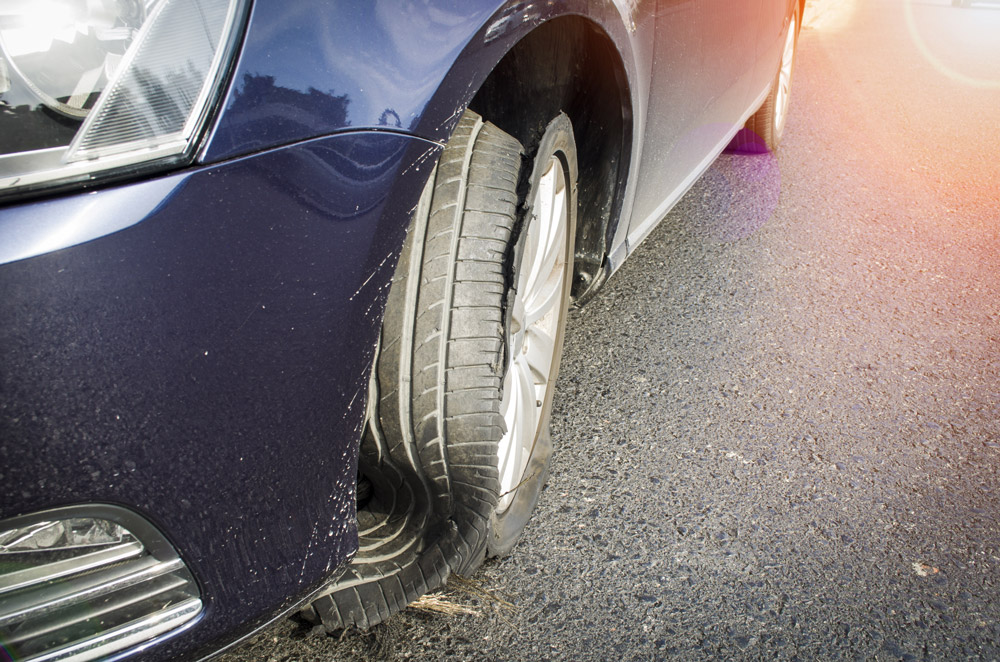 close-up of tire blowout. what to do when tire blows out concept
