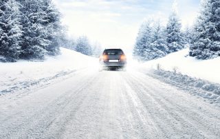 Car driving in snow