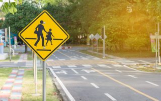 Pedestrian crossing road sign.