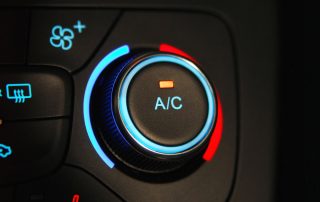 Air conditioning button in car.