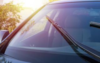 Car windshield with new wipers.