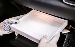 Car cabin filter installation.