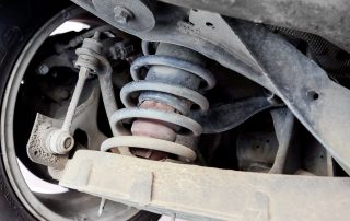 Suspension spring under vehicle