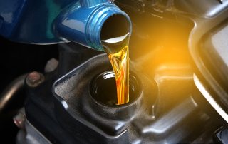 oil being poured into engine