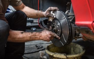 mechanic changing brakes
