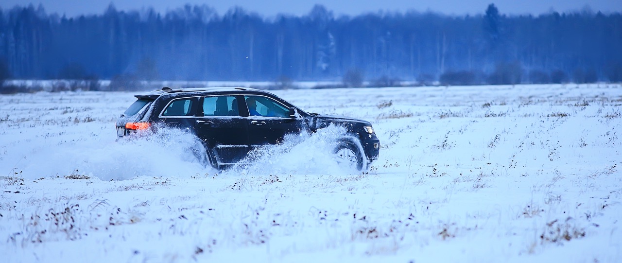 car driving on snowy road