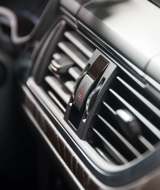 Close up image of AC vents in a car