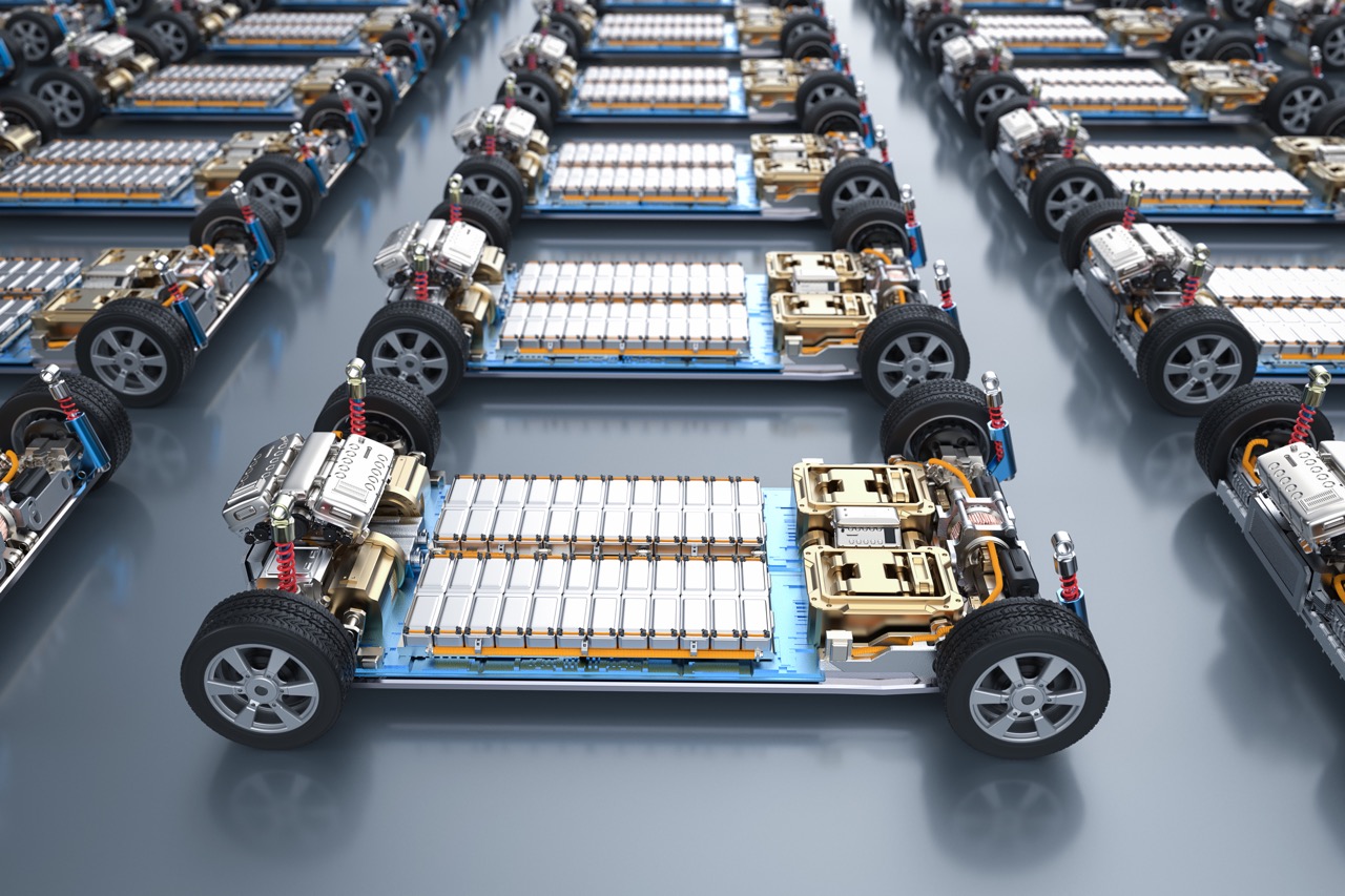 Row of ev car batteries in factory
